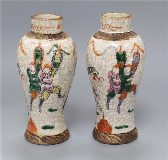 A pair of Chinese famille rose warrior crackleglaze vases, c.1900 height 18cm